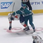 Macklin Celebrini cross-checks Aleksander Barkov as tensions boil over