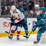 Oct 1, 2026; San Jose, California, USA; Florida Panthers center Aleksander Barkov (16) passes the puck during the first period against San Jose Sharks defense Michael Kesselring (7) at SAP Center at San Jose.