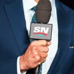 Jun 15, 2024; Edmonton, Alberta, CAN; Sportsnet host David Amber (left) and NHL Insider Elliotte Friedman (right) prior to the game between the Edmonton Oilers and the Florida Panthers in game four of the 2024 Stanley Cup Final at Rogers Place.