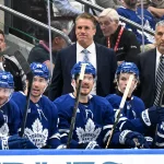 Sep 29, 2026; Toronto, Ontario, CAN; Toronto Maple Leafs head coach Jim Hiller watches game action in the third period against the Montreal Canadiens at Scotiabank Arena.