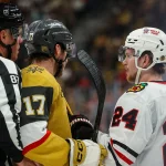 Sep 29, 2026; Las Vegas, Nevada, USA; Vegas Golden Knights center Marc Gatcomb (17) is separated from Chicago Blackhawks defenseman Bowen Byram (24) during the second period at T-Mobile Arena.