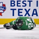 Oct 2, 2026; Dallas, Texas, USA; Dallas Stars center Roope Hintz (24) lays on the ice after being hit by St. Louis Blues defenseman Brandon Carlo (not pictured) during the third period at the American Airlines Center.
