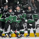 Apr 20, 2026; Dallas, Texas, USA; Dallas Stars defenseman Thomas Harley (55) and left wing Jason Robertson (21) and defenseman Nils Lundkvist (5) and center Matt Duchene (95) and center Mavrik Bourque (22) celebrates a goal scored by Robertson against the Minnesota Wild during the third period in game two of the first round of the 2026 Stanley Cup Playoffs at American Airlines Center.
