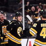 Sep 22, 2026; Boston, Massachusetts, USA; Boston Bruins center Michael Eyssimont (81) is congratulated by defenseman Frederic Brunet (42) and left wing Tanner Jeannot (84) after scoring a goal during the third period against the Philadelphia Flyers at TD Garden.