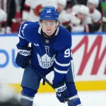 Oct 3, 2026; Toronto, Ontario, CAN; Toronto Maple Leafs left wing Gavin McKenna (92) waits for the face-off against the Ottawa Senators during the third period at Scotiabank Arena.