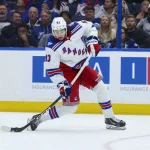 Apr 15, 2026; Tampa, Florida, USA; New York Rangers center Mika Zibanejad (93) shoots the puck against the Tampa Bay Lightning in the second period at Benchmark International Arena.
