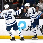 Mar 30, 2026; Anaheim, California, USA; Toronto Maple Leafs defenseman Morgan Rielly (44) celebrates after scoring a goal with Toronto Maple Leafs defenseman Oliver Ekman-Larsson (95) during the third period against the Anaheim Ducks at Honda Center.