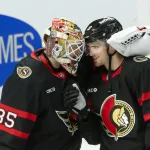 Dec 11, 2024; Ottawa, Ontario, CAN; Ottawa Senators goalie Linus Ullmark (35) and right wing Drake Batherson (19) celebrate their win against the Anaheim Ducks at the Canadian Tire Centre.