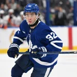 Sep 30, 2026; Toronto, Ontario, CAN; Toronto Maple Leafs forward Gavin McKenna (92) pursues the play against the New York Islanders in the third period at Scotiabank Arena.