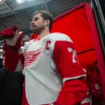 Dec 27, 2025; Raleigh, North Carolina, USA; Detroit Red Wings center Dylan Larkin (71) comes out of the locker room for the warmups before the game against the Carolina Hurricanes at Lenovo Center.