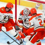 Two NHL forwards hit waivers as roster decisions come down to the wire May 6, 2026; Las Vegas, Nevada, USA; Anaheim Ducks goaltender Lukas Dostal (1) makes a save against the Vegas Golden Knights between center Jansen Harkins (24) and defenseman Jackson LaCombe (2) during the third period of game two of the second round of the 2026 Stanley Cup Playoffs at T-Mobile Arena. Mandatory Credit: Stephen R. Sylvanie-Imagn Images