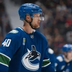 Oct 1, 2026; Vancouver, British Columbia, CAN; Vancouver Canucks forward Elias Pettersson (40) during a stop in play after injured in his chin against the Edmonton Oilers in the first period at Rogers Arena.