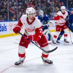 Feb 2, 2025; Vancouver, British Columbia, CAN; Detroit Red Wings forward Dylan Larkin (71) skates against the Vancouver Canucks in the third period at Rogers Arena.