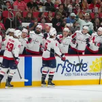 Oct 2, 2026; Raleigh, North Carolina, USA; Washington Capitals defenseman Jakob Chychrun (6) celebrates his goal against the Carolina Hurricanes during the second period at Lenovo Center.