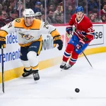 16 octobre 2025 ; Montréal, Québec, Canada ; le défenseur des Predators de Nashville Spencer Stastney (24) dispute la rondelle à l'ailier droit des Canadiens de Montréal Ivan Demidov (93) au cours de la deuxième période au Centre Bell.