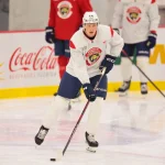 Sep 19, 2025; Fort Lauderdale, FL, USA; Florida Panthers right wing MacKenzie Entwistle (44) moves the puck during training camp at Baptist Health IcePlex.