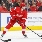 Oct 6, 2026; Detroit, Michigan, USA; Detroit Red Wings center Dylan Larkin (71) handles the puck during the second period against the Ottawa Senators at Little Caesars Arena.