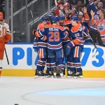 Apr 20, 2026; Edmonton, Alberta, CAN; Edmonton Oilers center Jack Roslovic (28), center Jason Dickinson (16) and center Ryan Nugent-Hopkins (93) celebrate a goal on the Anaheim Ducks in game one of the first round of the 2026 Stanley Cup Playoffs during the first period at Rogers Place.