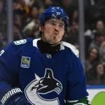 Sep 26, 2026; Vancouver, British Columbia, CAN; Vancouver Canucks right wing Brendan Gallagher (7) reacts to a shot during the third period against the Seattle Kraken at Rogers Arena