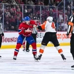 Nov 4, 2025; Montreal, Quebec, CAN; Philadelphia Flyers left wing Nicolas Deslauriers (44) fights against Montreal Canadiens defenseman Arber Xhekaj (72) during the third period at Bell Centre.