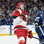 Leafs trade would send multiple pieces to Hurricanes for Alexander Nikishin in blockbuster proposal Mar 20, 2026; Toronto, Ontario, CAN; Carolina Hurricanes defenseman Alexander Nikishin (21) celebrates after scoring the winning goal in overtime against the Toronto Maple Leafs at Scotiabank Arena. Mandatory Credit: Dan Hamilton-Imagn Images