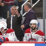 Oct 3, 2026; Pittsburgh, Pennsylvania, USA; Montreal Canadiens head coach Martin St. Louis (left) gestures on the bench against the Pittsburgh Penguins during the third period at PPG Paints Arena.