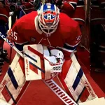 Le gardien du Canadien de Montréal, Samuel Montembeault, qui s'apprête à sauter sur la patinoire au Centre Bell.