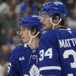 Mar 19, 2025; Toronto, Ontario, CAN; Toronto Maple Leafs forward Mitch Marner (16) and Toronto Maple Leafs forward Auston Matthews (34) during a break in the action against the Colorado Avalanche at Scotiabank Arena.