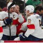 Sep 29, 2026; Raleigh, North Carolina, USA; Florida Panthers center Aleksander Barkov (16) talks to left wing Brady Tkachuk (8) during the first period against the Carolina Hurricanes at Lenovo Center.