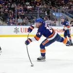 Blackhawks' $46 million forward faces in person hearing after hit to Bo Horvat's head Mar 24, 2026; Elmont, New York, USA; New York Islanders center Bo Horvat (14) takes a shot against Chicago Blackhawks defenseman Alex Vlasic (72) and center Frank Nazar (91) during the third period at UBS Arena. Mandatory Credit: Brad Penner-Imagn Images
