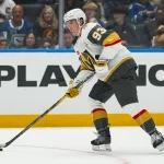 Mitch Marner takes a big shot at the Maple Leafs involving Ryan Reaves Oct 4, 2026; Vancouver, British Columbia, CAN; Vegas Golden Knights forward Mitch Marner (93) handles the puck against the Vancouver Canucks in the first period at Rogers Arena.