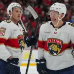 Sep 29, 2026; Raleigh, North Carolina, USA; Florida Panthers left wing Matthew Tkachuk (19) and left wing Brady Tkachuk (8) celebrate after defeating the Carolina Hurricanes in overtime at Lenovo Center.