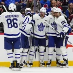 Oct 10, 2026; Denver, Colorado, USA; Members of the Toronto Maple Leafs celebrate a goal scored in the third period against the Toronto Maple Leafs at Ball Arena.