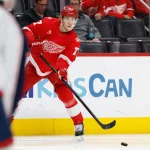 Apr 7, 2026; Detroit, Michigan, USA; Detroit Red Wings defenseman Simon Edvinsson (77) passes in the second period against the Columbus Blue Jackets at Little Caesars Arena.