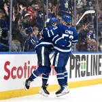 Sep 29, 2026; Toronto, Ontario, CAN; Toronto Maple Leafs forward William Nylander (88) celebrates with forward Easton Cowan (53) after scoring a goal against the Montreal Canadiens in the third period at Scotiabank Arena.
