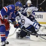 Elliotte Friedman provides details on Connor Hellebuyck-to-Rangers trade after Shesterkin injury Nov 12, 2024; New York, New York, USA; Winnipeg Jets goaltender Connor Hellebuyck (37) defends against a shot on goal attempt by New York Rangers right wing Reilly Smith (91) in the second period at Madison Square Garden. Mandatory Credit: Wendell Cruz-Imagn Images