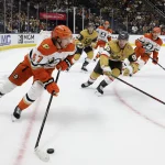 Oct 2, 2026; Las Vegas, Nevada, USA; Anaheim Ducks defenseman Tristan Luneau (67) advances the puck out of the defensive zone against Vegas Golden Knights left wing Victor Olofsson (95) at T-Mobile Arena.