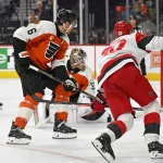 Philadelphia Flyers fans take extreme measures after seventh straight loss Oct 11, 2026; Philadelphia, Pennsylvania, USA; Carolina Hurricanes center Sebastian Aho (20) scores a goal against Philadelphia Flyers defenseman Travis Sanheim (6) and goaltender Joseph Woll (53) during the second period at Xfinity Mobile Arena. Mandatory Credit: Eric Hartline-Imagn Images
