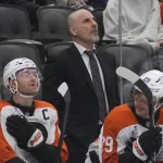 Flyers' stance on Rick Tocchet revealed after historic 0-5-2 start Mar 2, 2026; Toronto, Ontario, CAN; Philadelphia Flyers head coach Rick Tocchet (center) looks up at the scoreboard during a game against the Toronto Maple Leafs at Scotiabank Arena. Mandatory Credit: John E. Sokolowski-Imagn Images