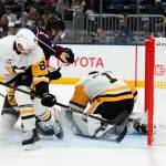 Penguins & Sabres complete trade involving three defenseman Sep 24, 2026; Columbus, Ohio, USA; Columbus Blue Jackets forward Danton Heinen (58) battles for the puck against Pittsburgh Penguins defenseman Caleb Jones (82) and goaltender Sergei Murashov (1) in the second period at Nationwide Arena