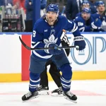 Sep 23, 2026; Toronto, Ontario, CAN; Toronto Maple Leafs defenseman Chris Tanev (8) pursues the play against the Ottawa Senators in the third period at Scotiabank Arena.