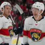 Sep 29, 2026; Raleigh, North Carolina, USA; Florida Panthers left wing Matthew Tkachuk (19) and left wing Brady Tkachuk (8) celebrate after defeating the Carolina Hurricanes in overtime at Lenovo Center.