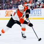 Apr 11, 2026; Winnipeg, Manitoba, CAN; Philadelphia Flyers forward Owen Tippett (74) skates into the Winnipeg Jets zone during the first period at Canada Life Centre.