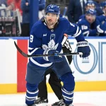 Sep 23, 2026; Toronto, Ontario, CAN; Toronto Maple Leafs defenseman Chris Tanev (8) pursues the play against the Ottawa Senators in the third period at Scotiabank Arena.