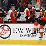 Sep 30, 2026; Philadelphia, Pennsylvania, USA; Philadelphia Flyers right wing Matvei Michkov (39), center Noel Acciari (52), center Sean Couturier (14) and right wing Travis Konecny (11) react after loss to the Pittsburgh Penguins at Xfinity Mobile Arena.