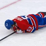 Noah Dobson leaves bleeding after puck to the jaw tonight