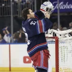 Oct 11, 2026; New York, New York, USA; New York Rangers goaltender Dylan Garand (33) takes to the net for the start of the game against the Vancouver Canucks at Madison Square Garden.