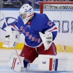 Oct 13, 2026; New York, New York, USA; New York Rangers goaltender Dylan Garand (33) makes a save against the Tampa Bay Lightning during the second period at Madison Square Garden.