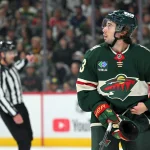 Oct 3, 2026; Saint Paul, Minnesota, USA; Minnesota Wild defensemen Quinn Hughes (43) watches a replay on the scoreboard after a whistle against the Boston Bruins during the second period at Grand Casino Arena.