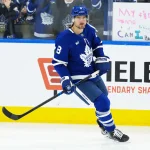 Oct 18, 2025; Toronto, Ontario, CAN; Toronto Maple Leafs defenseman Chris Tanev (8) skates during the warmup before a game against the Seattle Kraken at Scotiabank Arena.
